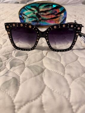 Quay x Lizzo Icy Black Rose Fade sunglasses.